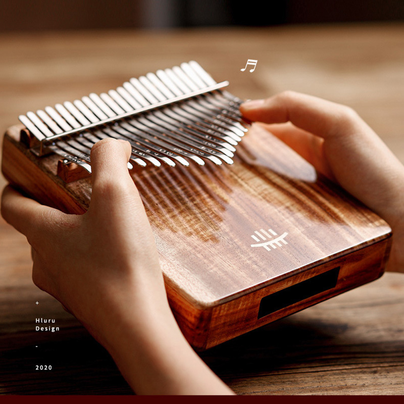 A Musical Instrument With Keys - Hluru 칼림바 풀 솔리드 우드 엄지